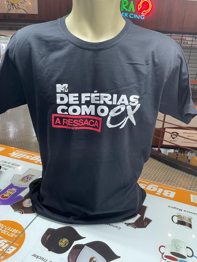 A black t-shirt with a humorous slogan about holidays and hangovers is displayed.