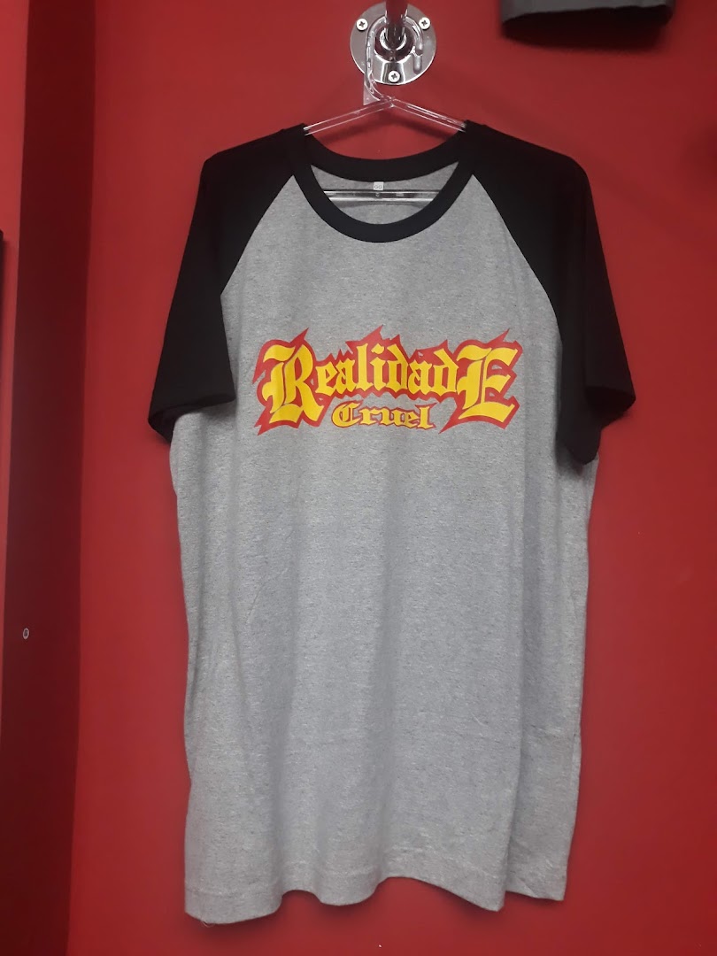 A grey t-shirt with black sleeves and a red and yellow graphic print.