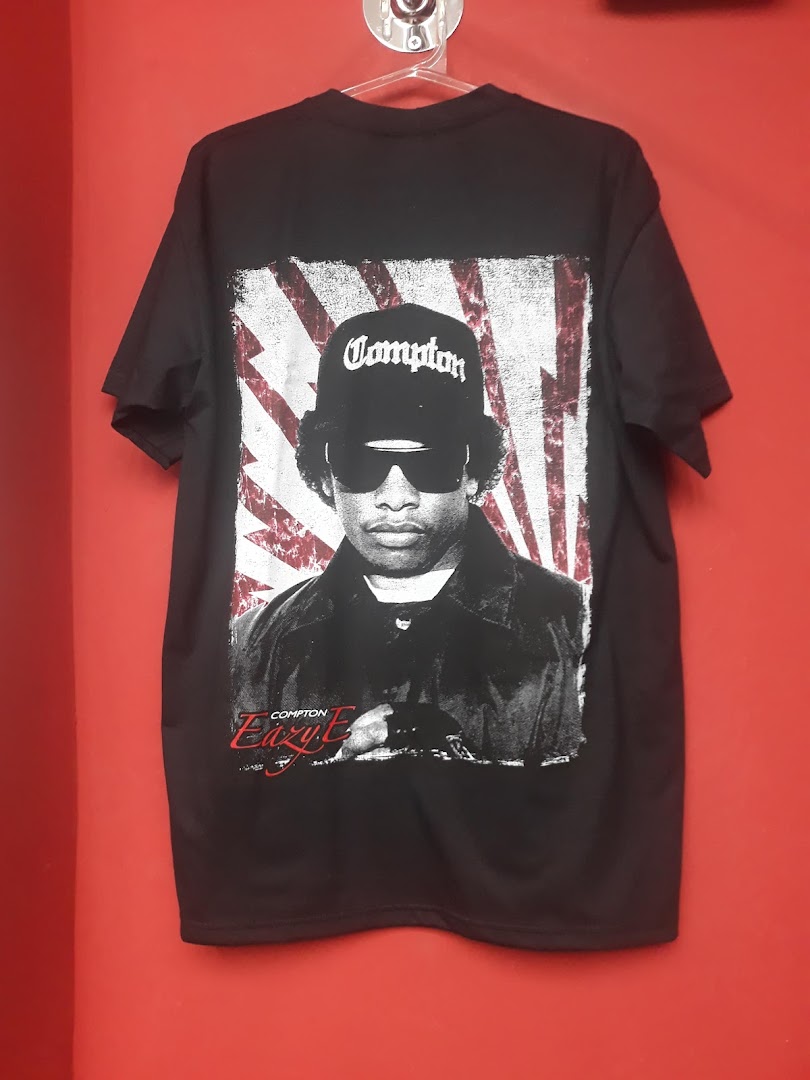 A black t-shirt featuring a graphic print of Eazy-E with a Compton hat.