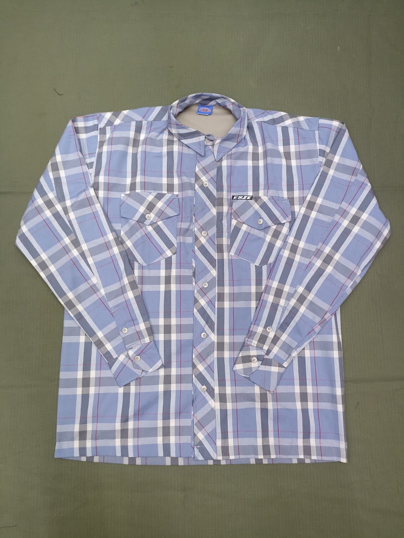 A light blue plaid long-sleeved shirt with two chest pockets and a brand logo.