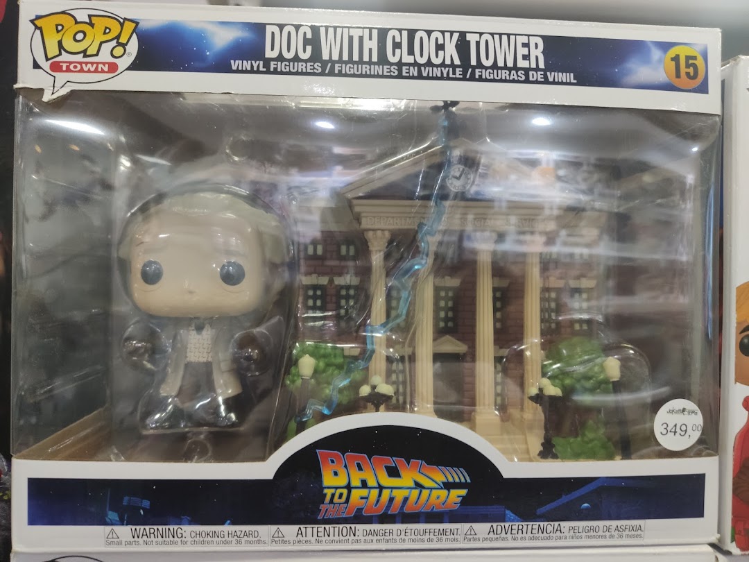 A Funko Pop! Town vinyl figure set of Doc Brown with the Clock Tower from Back to the Future.