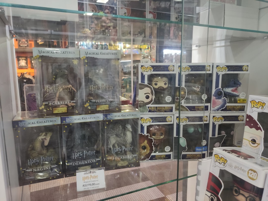 A display case filled with Harry Potter and other pop culture collectible figures.