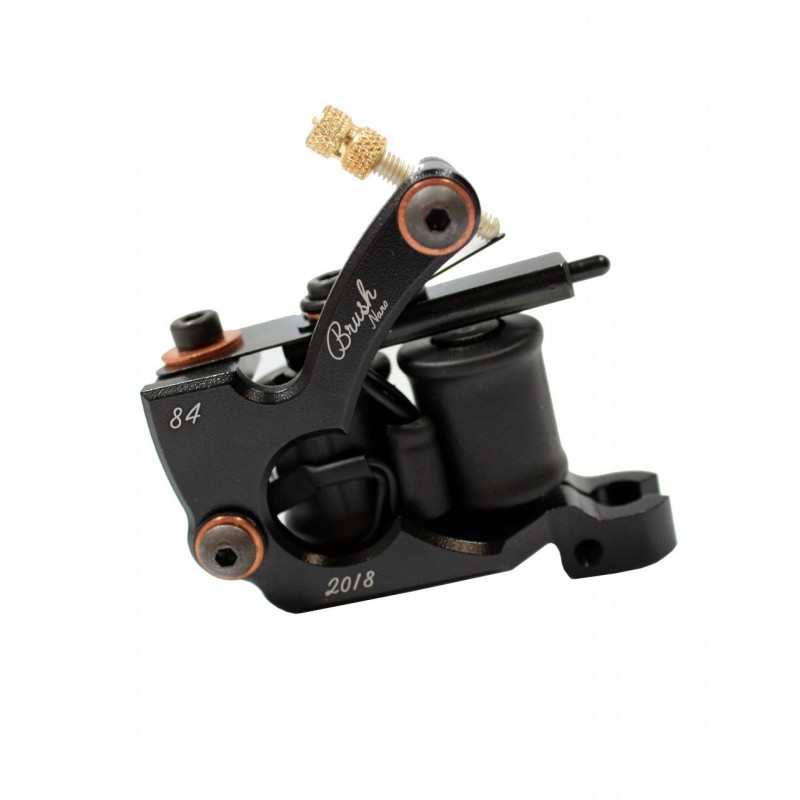 A black tattoo machine with gold accents and 'Brush Nano' branding.