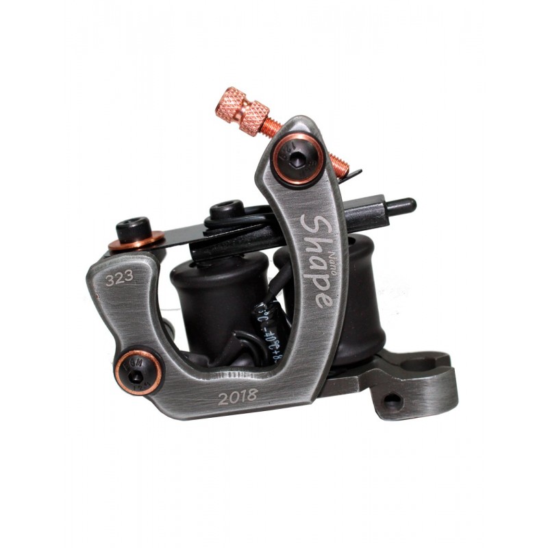 A close-up studio shot of a professional tattoo machine with intricate detailing.