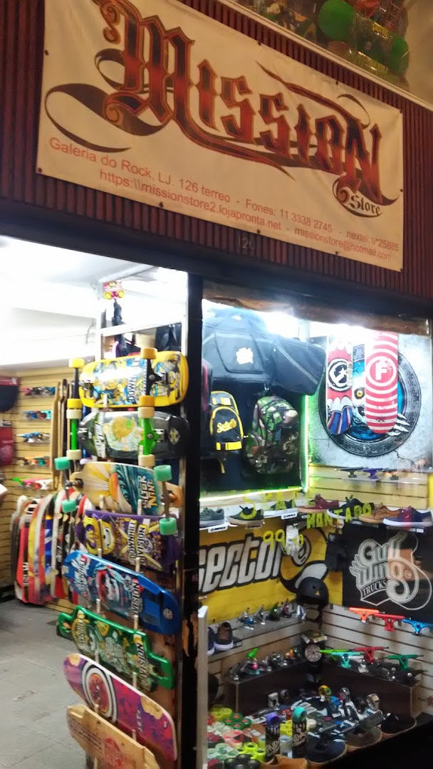 Mission Skate Shop storefront displaying various skateboards, backpacks, and skate accessories.