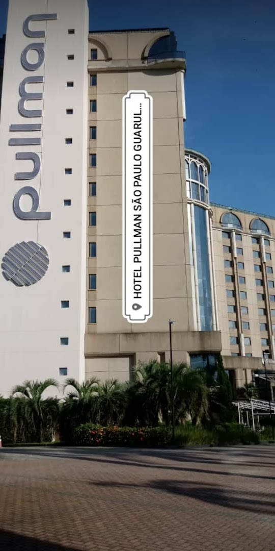 Exterior view of the Pullman Hotel in Sao Paulo Guarulhos with its prominent signage.