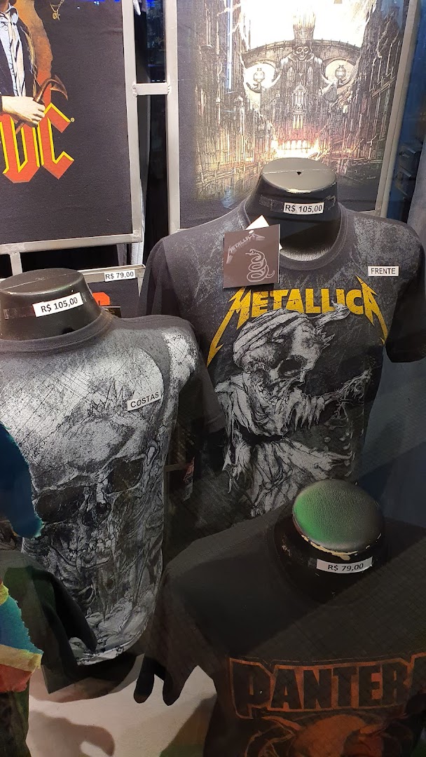 Mannequins display band t-shirts with rock-themed graphics and prices.