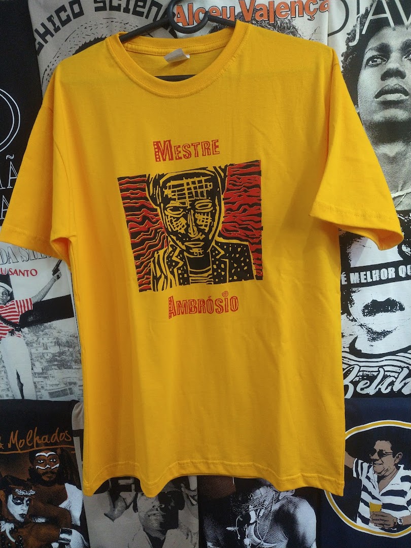 A yellow t-shirt with a graphic print of a person's face and text.