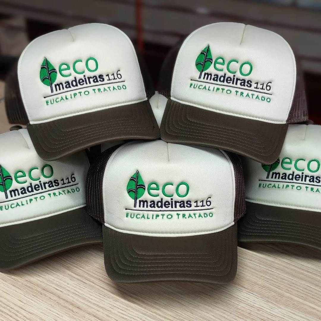 A collection of custom embroidered trucker hats with a green leaf logo and text.