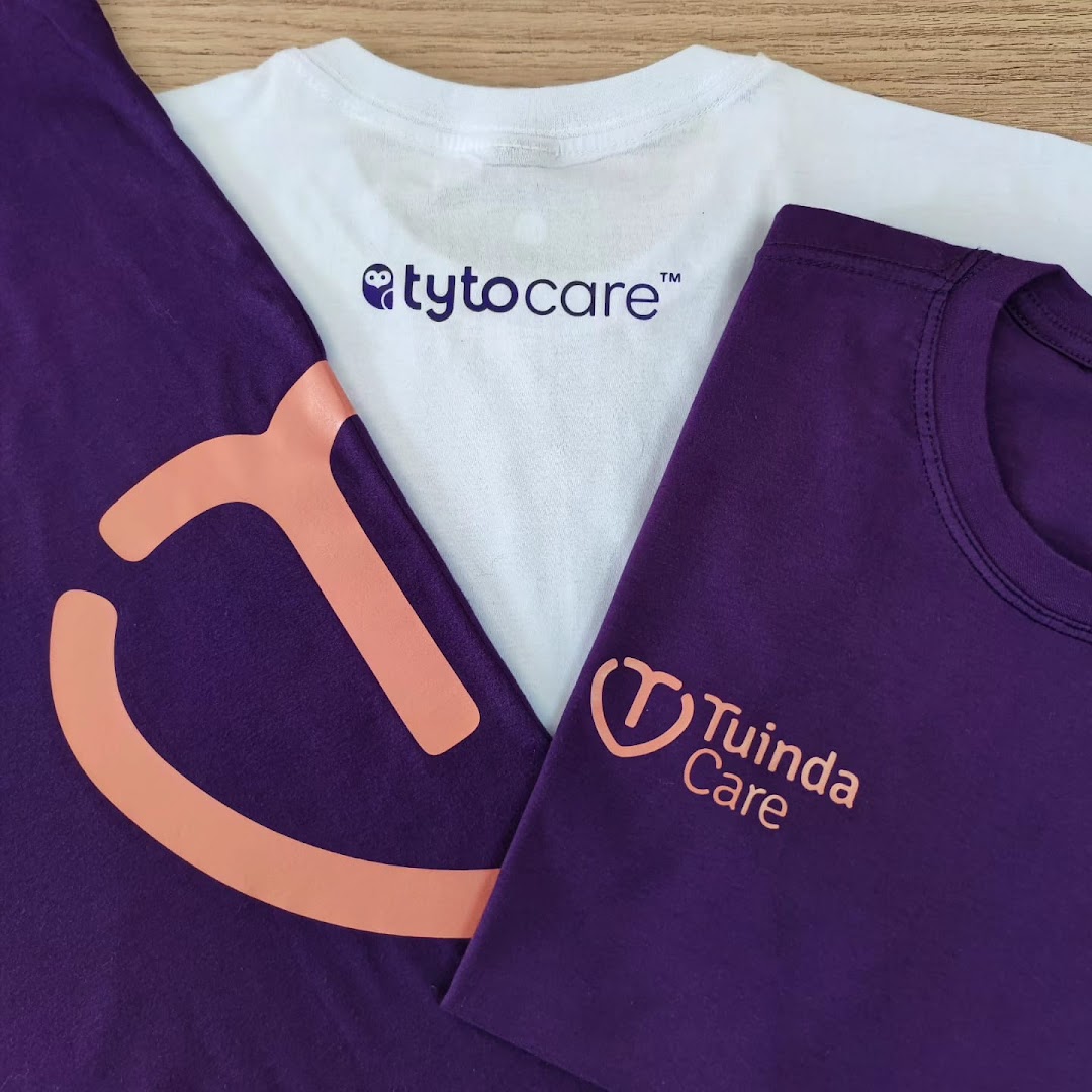 Three t-shirts with custom logos and branding in purple and white.