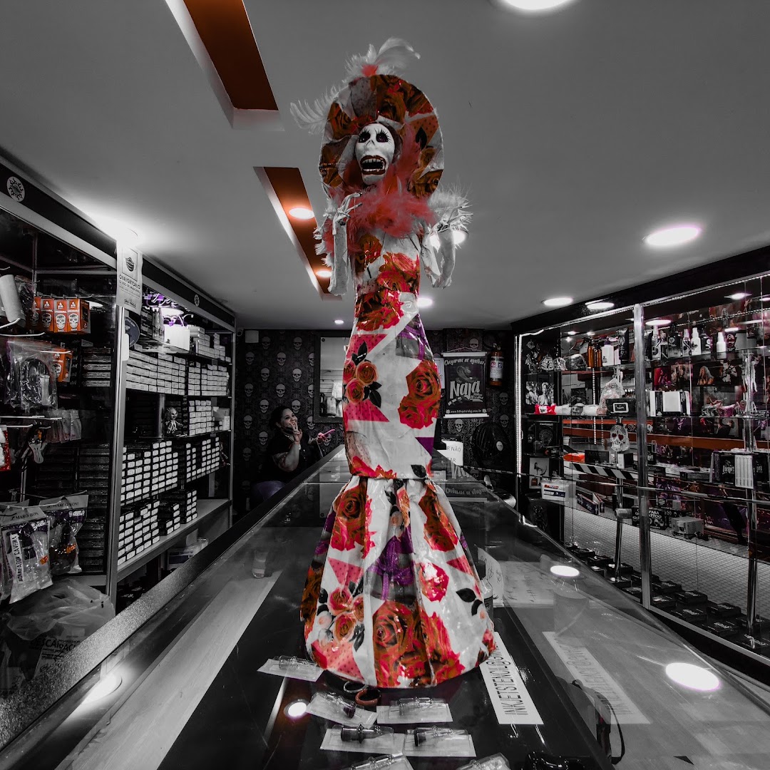 Interior of a piercing shop with a decorative skeleton figure and display cases.