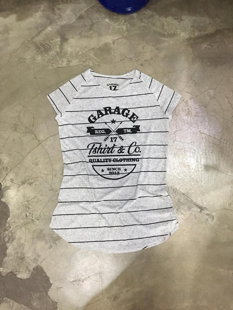 A grey t-shirt with black horizontal stripes and a graphic logo on the front.